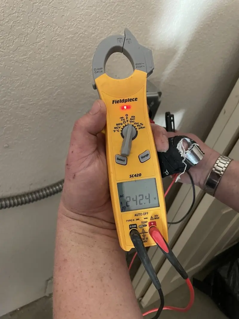 Voltage testing with clamp meter during Electrical Installation Services in Beacon Falls